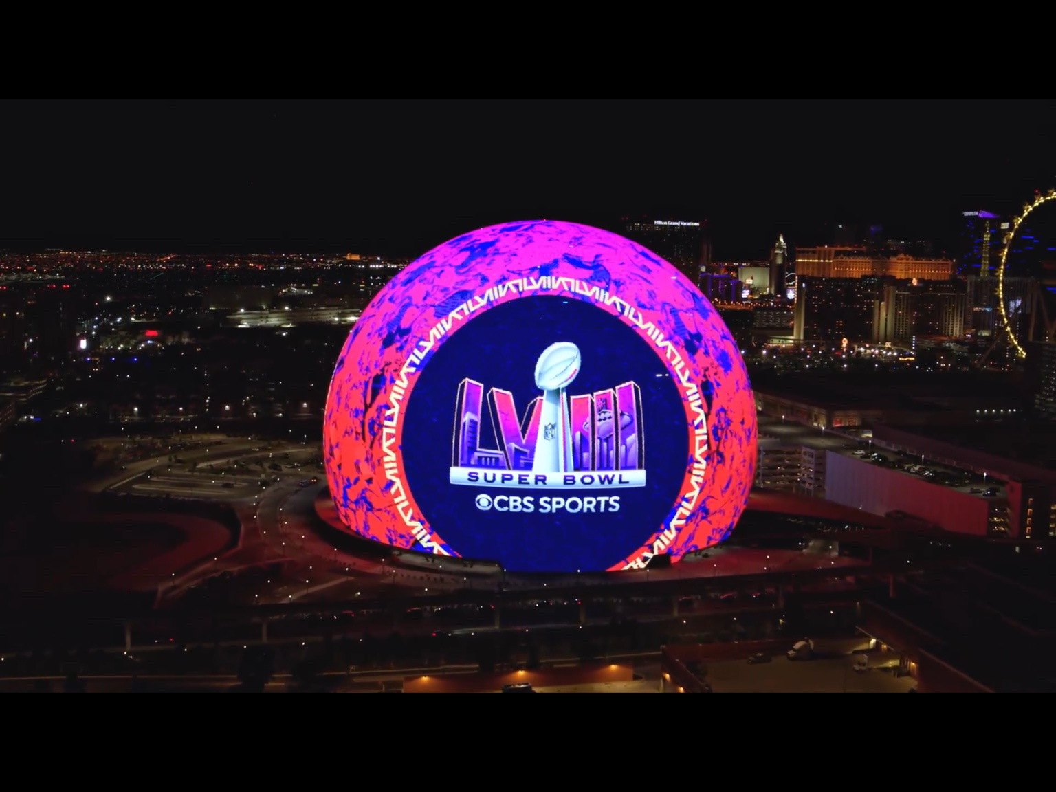 CBS Sports Super Bowl campaign on Sphere, with the Las Vegas skyline at night.